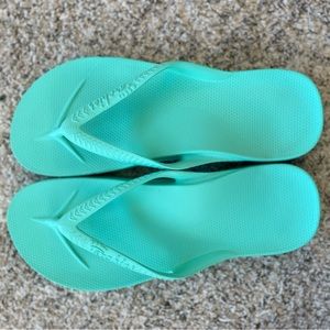 Archie’s flip flops